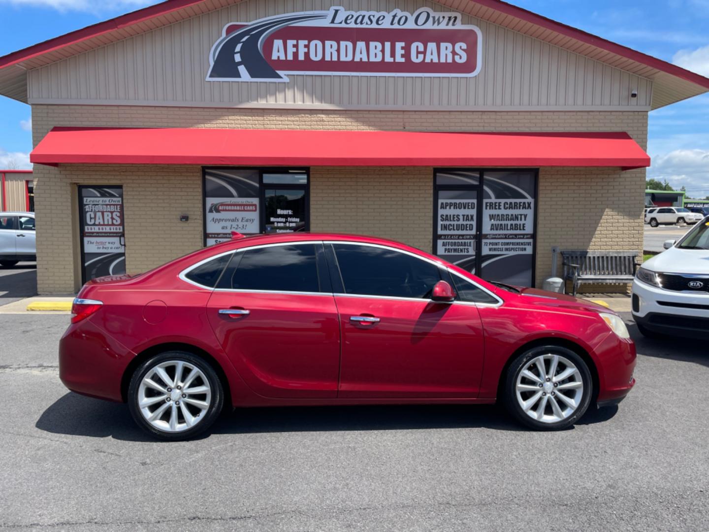 2014 Maroon Buick Verano (1G4PR5SK6E4) with an 4-Cyl, ECOTEC, 2.4 Liter engine, Auto, 6-Spd w/Shft Ctrl transmission, located at 8008 Warden Rd, Sherwood, AR, 72120, (501) 801-6100, 34.830078, -92.186684 - Photo#0